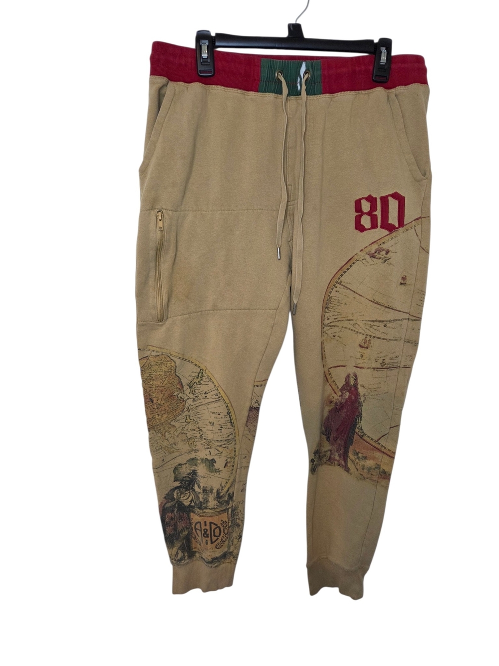 Akoo Tan Joggers with Red Waistband and Map Graphic
